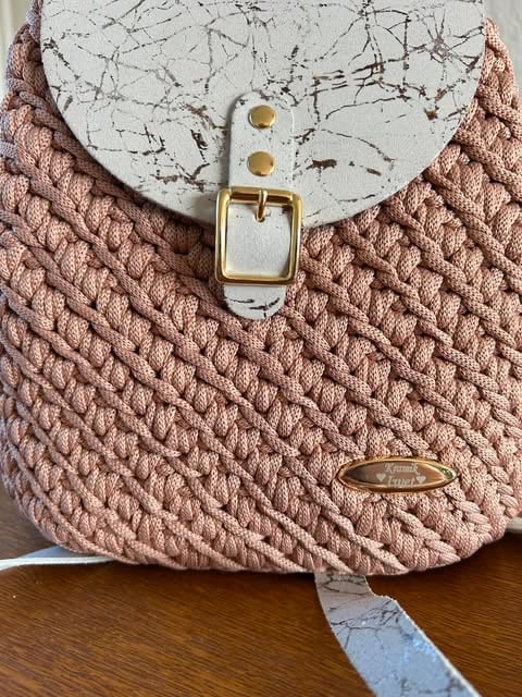 Rose quilted crossbody bag with white weathered leather flap and gold buckle closure